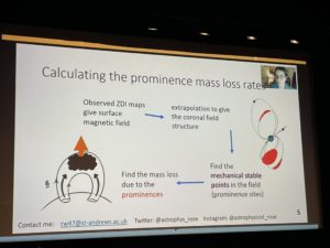 Rose, a white person, gives a talk via zoom. The screen shows a flow chart of the method for calculating prominence mass loss rates.
